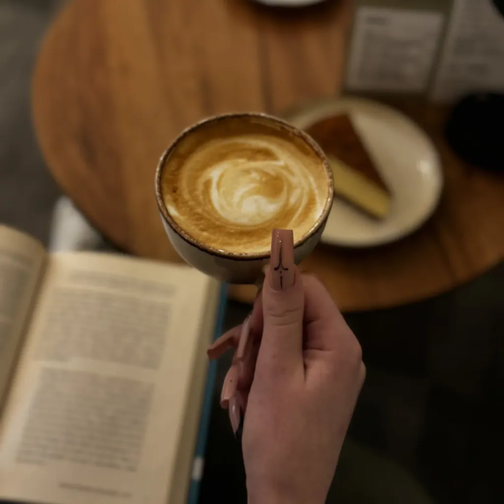 Latte with a heart drawn in the milk foam