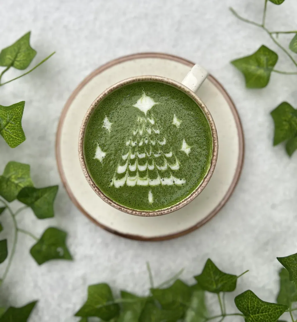 Matcha latte with a pattern in the foam